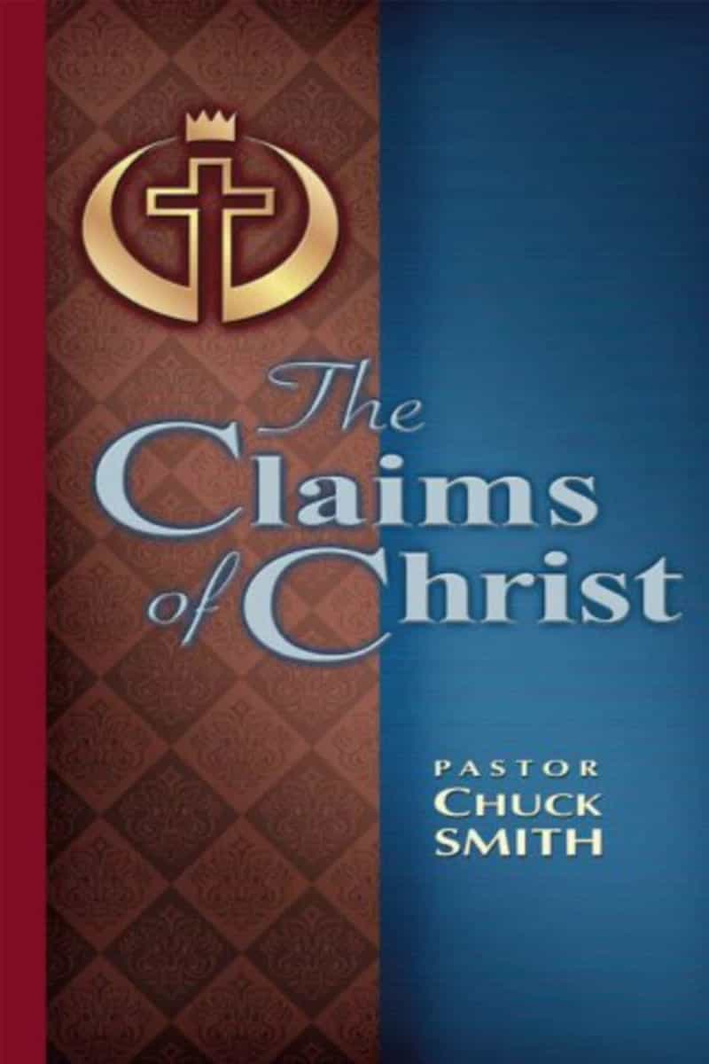 Book cover: a gold crowned cross on deep red and blue.